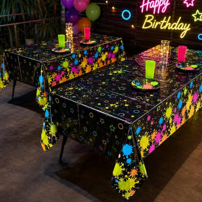 2 Pack Neon Paint Splatter Glow in the Dark Plastic Tablecloth 54x108 Inch - color: Neon Glow Tablecloth